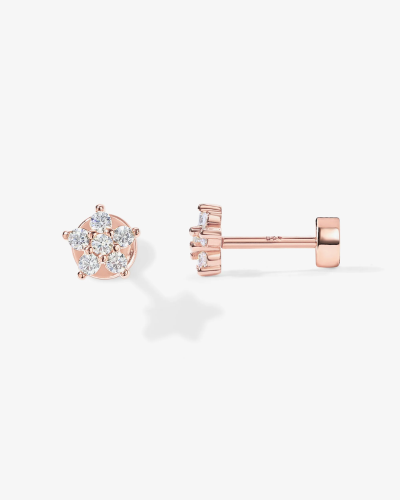 Rose gold earrings on a white background