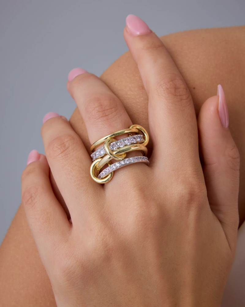 Model wearing chunky Interlocked Stackable Ring on index finger